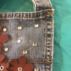 Refashioned jean pocket into  handbag UP0009